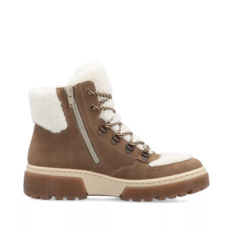 Bottines marron et beige chaudes pour femme marque Rieker. Référence X8611-60 Wood/off white. Disponible chez Chauss'Family magasin de chaussures Issoire.