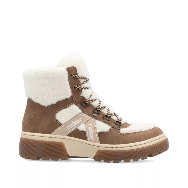 Bottines marron et beige chaudes pour femme marque Rieker. Référence X8611-60 Wood/off white. Disponible chez Chauss'Family magasin de chaussures Issoire.